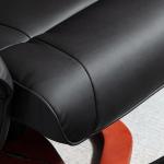 Snurrbar Massagestol med Pall, Bekväm Relaxfåtölj i Konstläder med Liggfunktion, Ergonomisk Vilostol för Vardagsrum, Svart, 73 x 83 x 106 cm